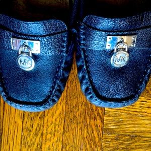 Michael Kors used black leather loafers